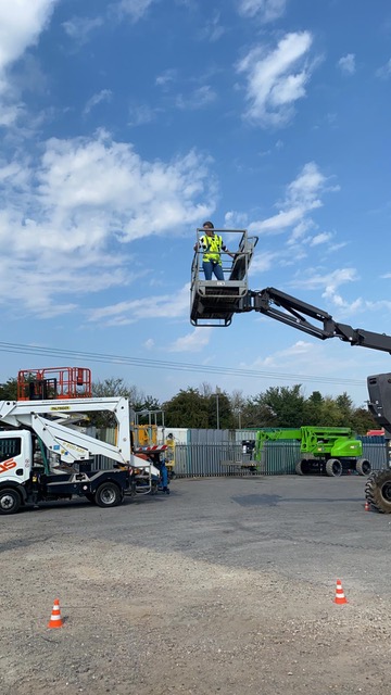Photos of cherry-picker access platform which we use to reach the highest windows on tall buildings Photos of cherry-picker access platform which we use to reach the highest windows on tall buildings